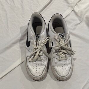 Nike Kids White Sneakers with Black Swoosh